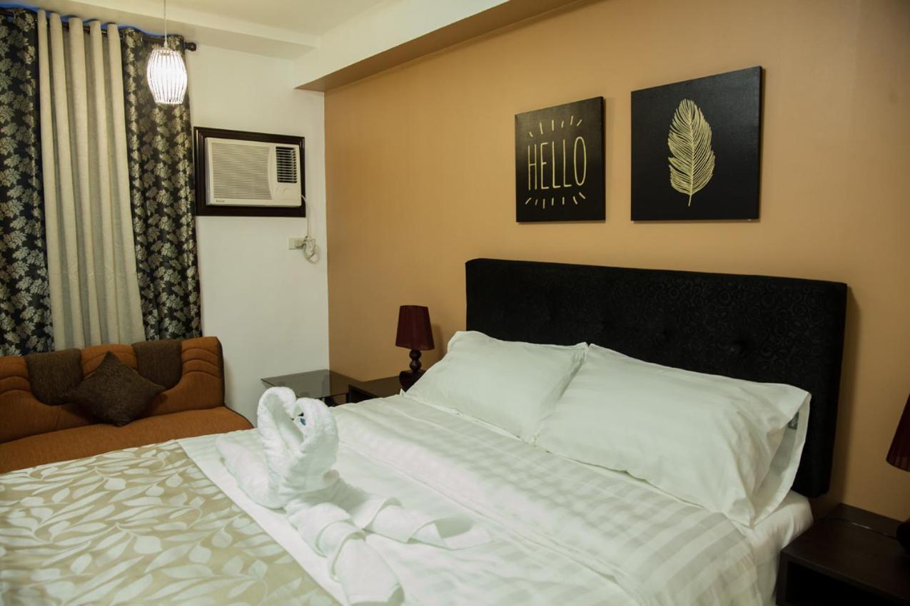 Melbourne Suites Makati City Екстер'єр фото